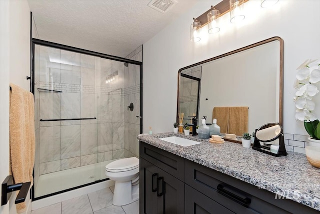659 N Palmetto Dr, Eagle, ID 83616 - bathroom with vanity, visible vents, a shower stall, and toilet