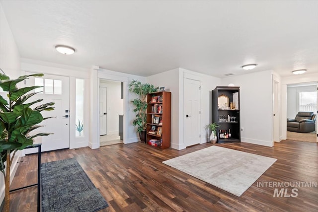 659 N Palmetto Dr, Eagle, ID 83616 - entrance foyer featuring baseboards and wood finished floors