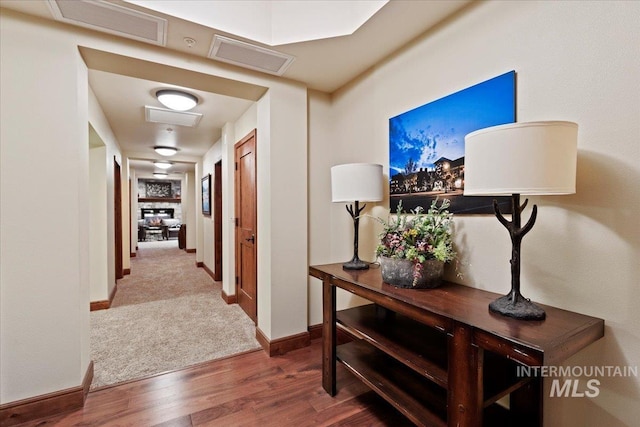 corridor featuring hardwood / wood-style flooring