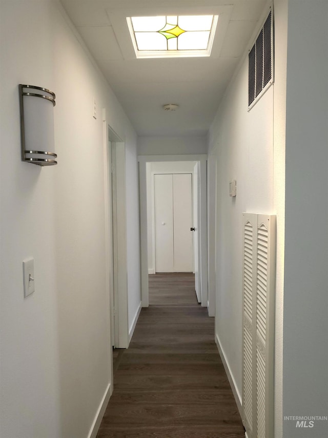 116 E 2nd St, Middleton, ID 83644 - hallway with dark wood-type flooring and baseboards