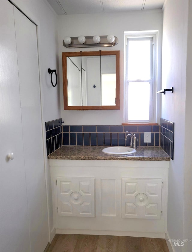 116 E 2nd St, Middleton, ID 83644 - bathroom with vanity and wood finished floors