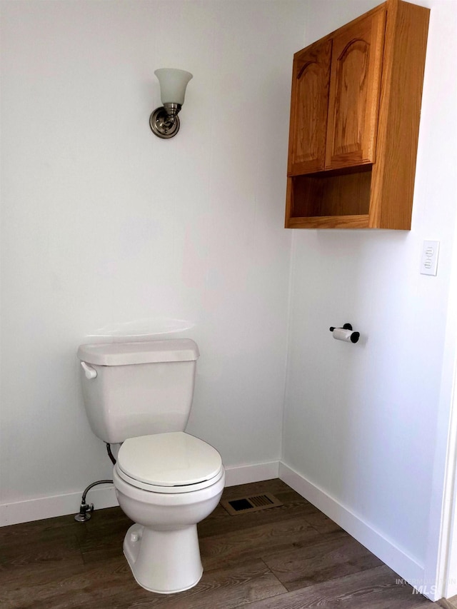116 E 2nd St, Middleton, ID 83644 - bathroom with baseboards, toilet, and wood finished floors