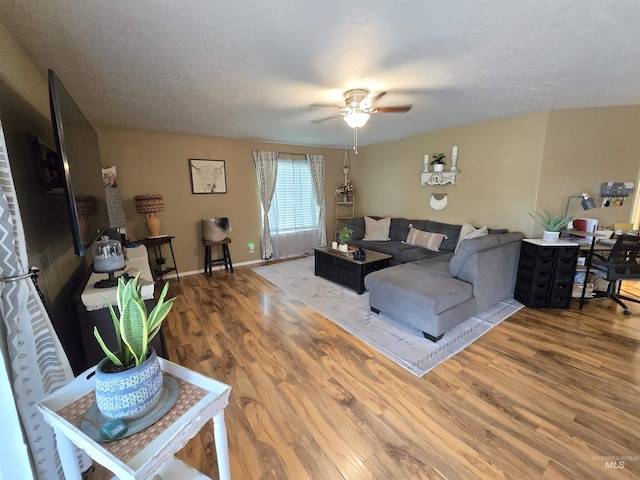 1451 Spurlock Ct, Twin Falls, ID 83301 - living room featuring ceiling fan and wood finished floors