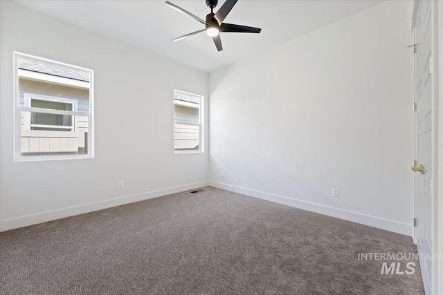 8820 E Snow Drop St, Nampa, ID 83687 - spare room featuring carpet floors, a ceiling fan, and baseboards