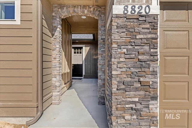 8820 E Snow Drop St, Nampa, ID 83687 - property entrance featuring stone siding