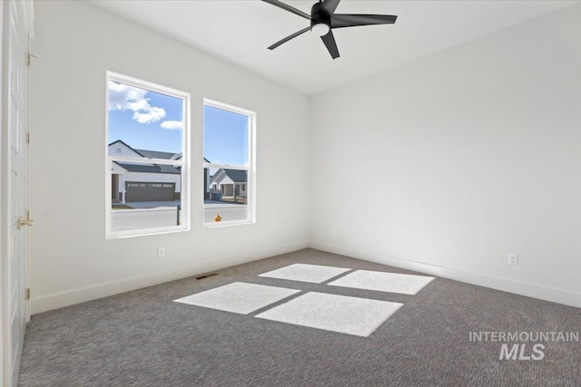8820 E Snow Drop St, Nampa, ID 83687 - carpeted spare room featuring baseboards and ceiling fan