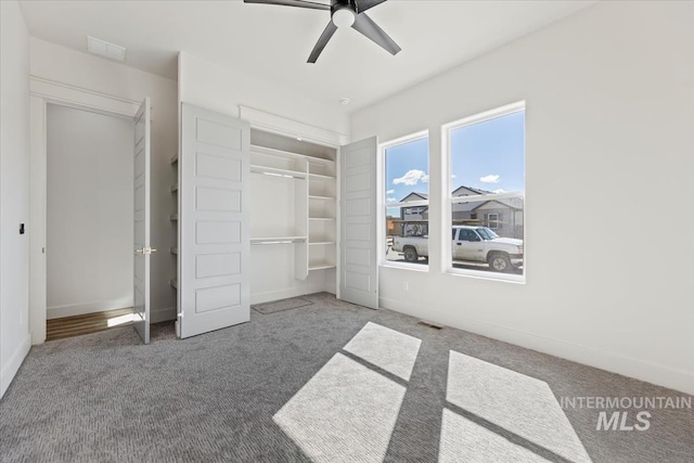 8820 E Snow Drop St, Nampa, ID 83687 - unfurnished bedroom featuring carpet floors, baseboards, visible vents, and ceiling fan