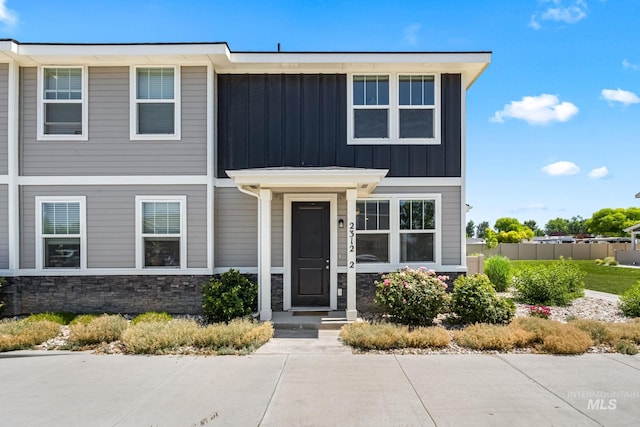 2312 E Spice Loop Unit 2, Nampa, ID 83687 - view of front of property featuring board and batten siding and stone siding