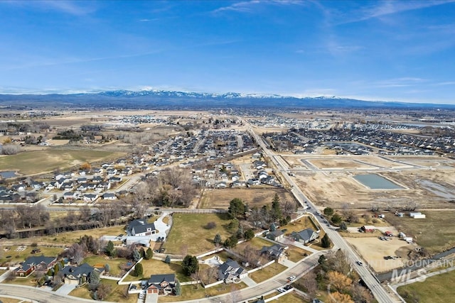 bird's eye view with a residential view and a mountain view