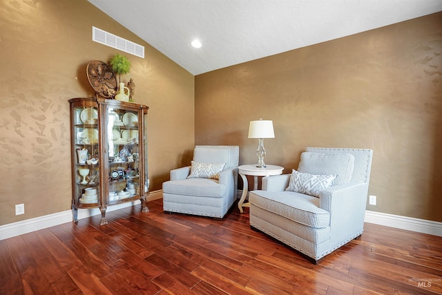 72 Pelican Dr, Rupert, ID 83350 - sitting room with wood finished floors, baseboards, vaulted ceiling, and visible vents