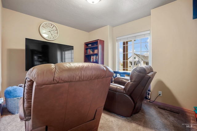 72 Pelican Dr, Rupert, ID 83350 - carpeted living area featuring a textured ceiling and baseboards