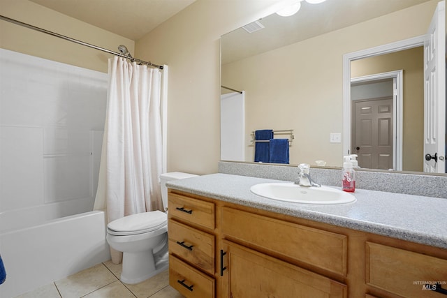 72 Pelican Dr, Rupert, ID 83350 - bathroom featuring visible vents, shower / bath combination with curtain, toilet, vanity, and tile patterned flooring