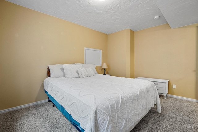 72 Pelican Dr, Rupert, ID 83350 - bedroom featuring carpet, baseboards, and a textured ceiling
