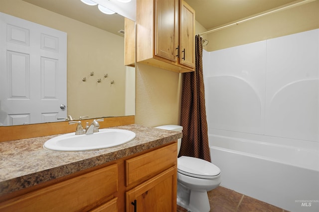 72 Pelican Dr, Rupert, ID 83350 - full bathroom featuring toilet, shower / tub combo, vanity, and tile patterned flooring