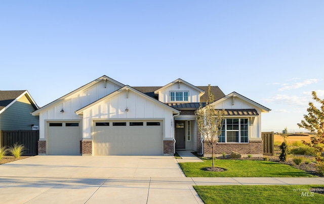 view of front of property with board and batten siding, brick siding, and driveway