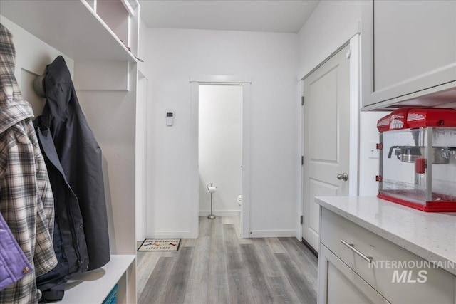 209 W 13th Ave, Jerome, ID 83338 - mudroom featuring light wood finished floors and baseboards