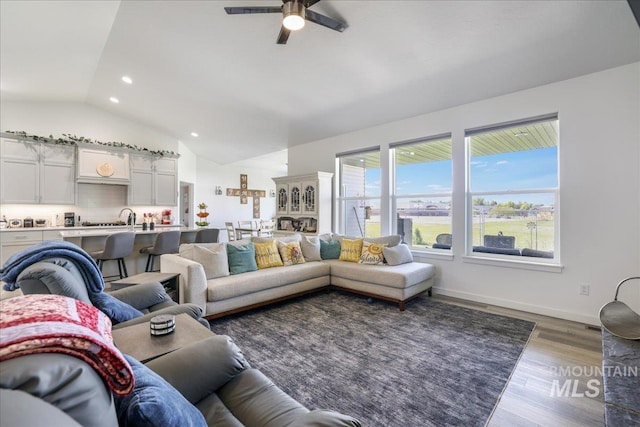 209 W 13th Ave, Jerome, ID 83338 - living room with lofted ceiling, ceiling fan, wood finished floors, and recessed lighting