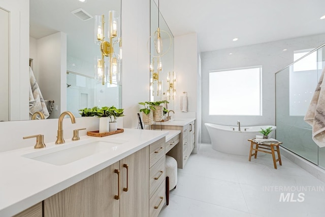 bathroom with vanity, separate shower and tub, and tile patterned floors