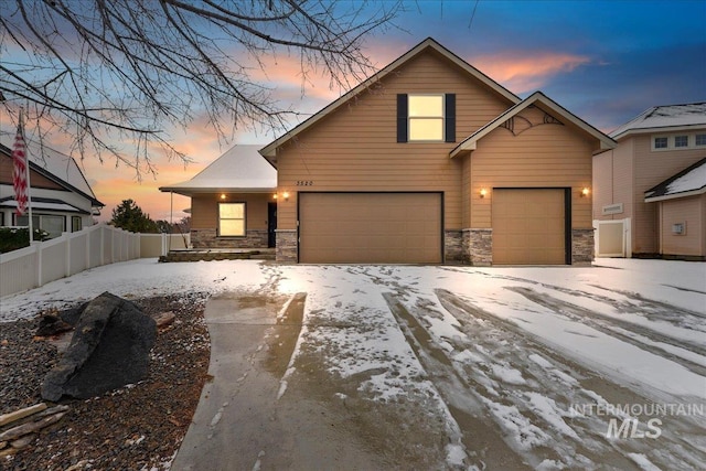 view of front of property with a garage