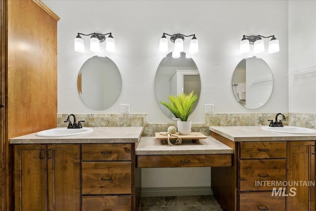 bathroom with vanity and tile patterned floors