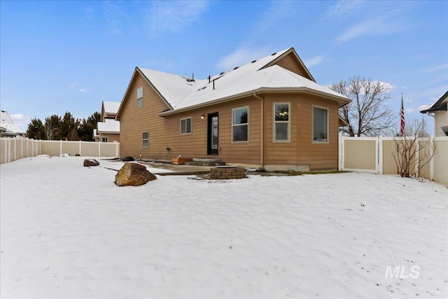 view of snow covered property