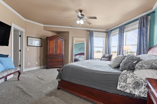 carpeted bedroom with visible vents, ceiling fan, crown molding, and baseboards