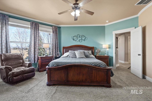 bedroom featuring light carpet, baseboards, visible vents, and ornamental molding