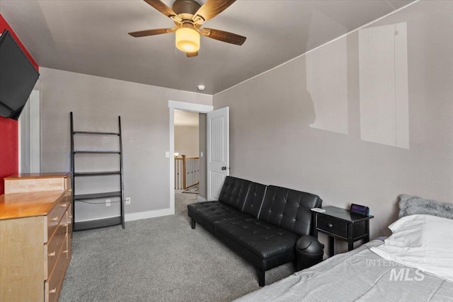 bedroom with baseboards, carpet floors, and a ceiling fan