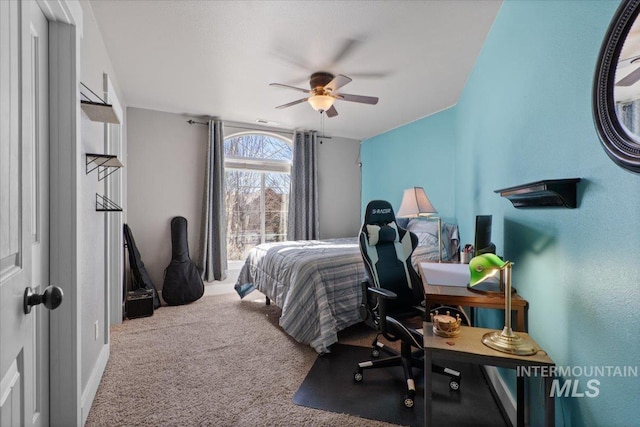 bedroom featuring carpet flooring, baseboards, and ceiling fan