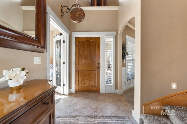 foyer with light tile patterned floors