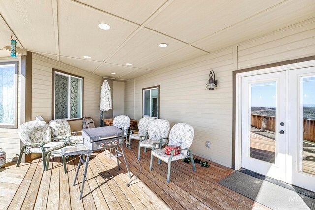 wooden terrace featuring french doors