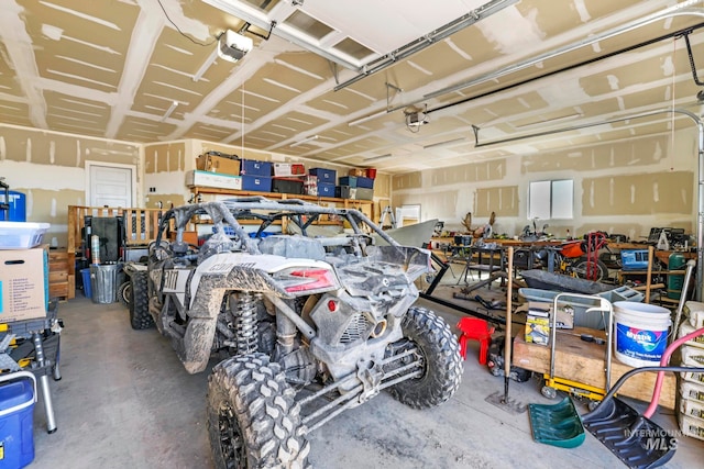 garage featuring a garage door opener