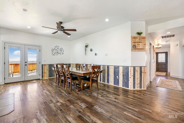 dining space with plenty of natural light, dark hardwood / wood-style floors, ceiling fan, and french doors