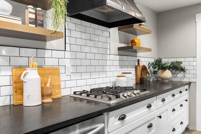 473 E Ranch Dr, Eagle, ID 83616 - kitchen with stainless steel gas stovetop, open shelves, backsplash, dark countertops, and custom exhaust hood