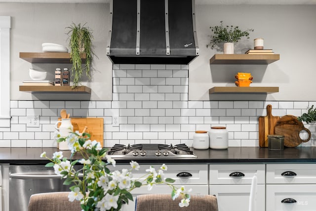 473 E Ranch Dr, Eagle, ID 83616 - kitchen featuring open shelves, exhaust hood, dark countertops, and tasteful backsplash