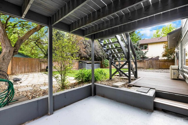 473 E Ranch Dr, Eagle, ID 83616 - fenced backyard with a patio, stairs, and a deck