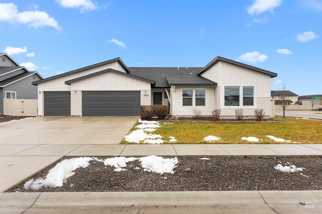 view of front facade with a garage and a front lawn