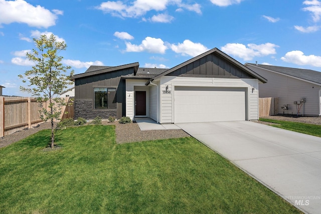 view of front of property with fence, board and batten siding, concrete driveway, and a garage