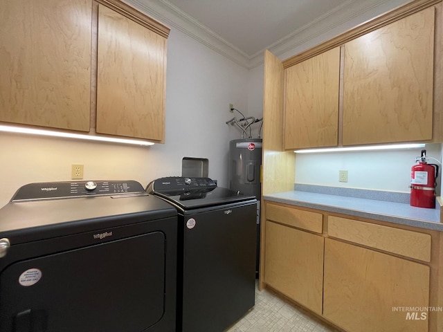 laundry room with water heater, cabinets, ornamental molding, and washing machine and clothes dryer