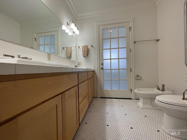 bathroom featuring ornamental molding, a bidet, and vanity