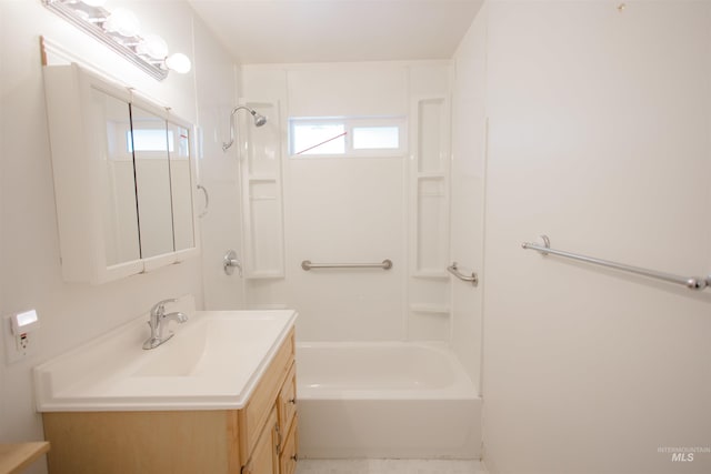 full bathroom featuring vanity, healthy amount of natural light, and shower / tub combination