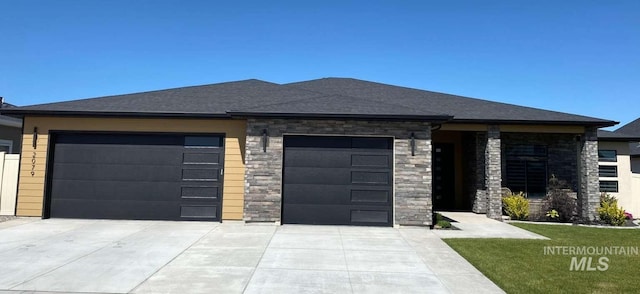 prairie-style house featuring a garage