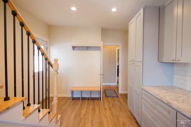 260 State St, Grand View, ID 83624 - foyer with recessed lighting, light wood-type flooring, baseboards, and stairs