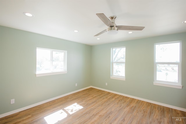 260 State St, Grand View, ID 83624 - unfurnished room with light wood-style floors, baseboards, recessed lighting, and ceiling fan