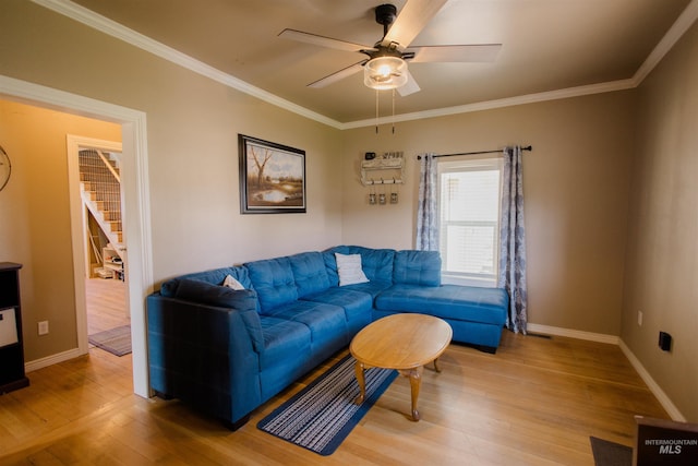 260 State St, Grand View, ID 83624 - living room featuring wood finished floors, ceiling fan, baseboards, and crown molding
