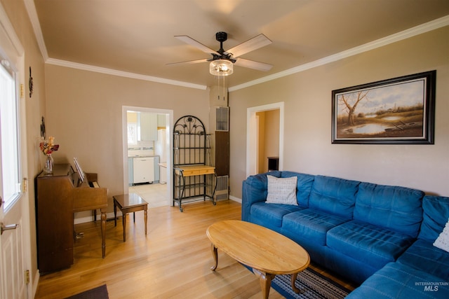 260 State St, Grand View, ID 83624 - living area with light wood-type flooring, ceiling fan, ornamental molding, and baseboards