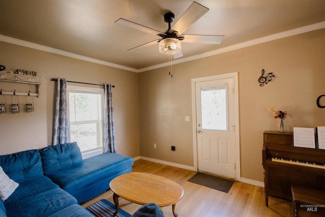 260 State St, Grand View, ID 83624 - living area with light wood-style flooring, crown molding, baseboards, and ceiling fan