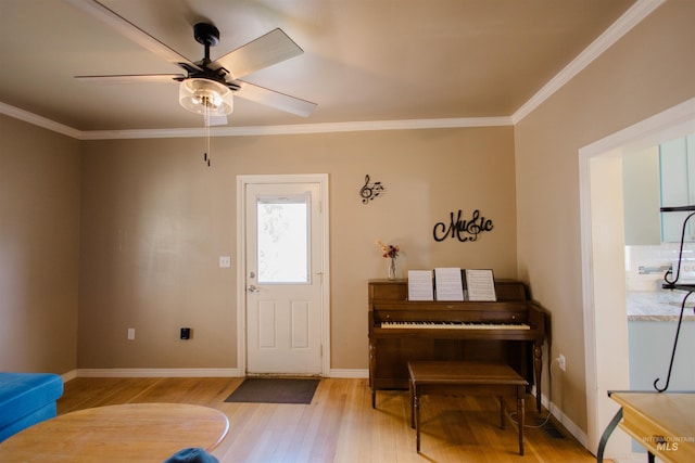 260 State St, Grand View, ID 83624 - foyer with light wood-style flooring, ceiling fan, ornamental molding, and baseboards