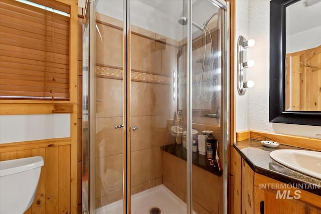 150 W Yuba Vista Dr, Atlanta, ID 83716 - full bath with toilet, vanity, a stall shower, and a textured wall