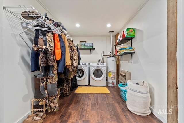 150 W Yuba Vista Dr, Atlanta, ID 83716 - washroom with washing machine and dryer, water heater, wood finished floors, recessed lighting, and crown molding